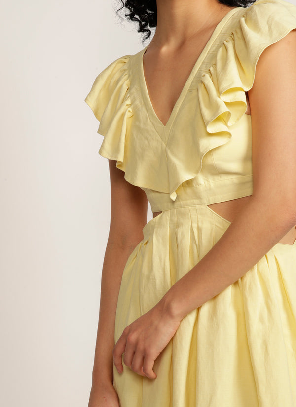 Close up of ruffle detail on yellow maxi dress with cutouts